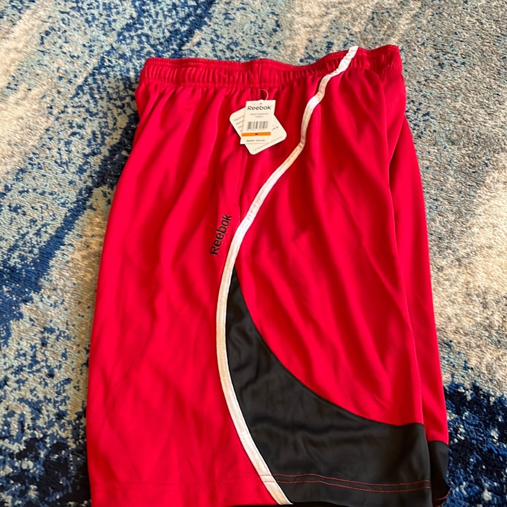 NWTs mens Reebok athletic shorts. Sz Medium